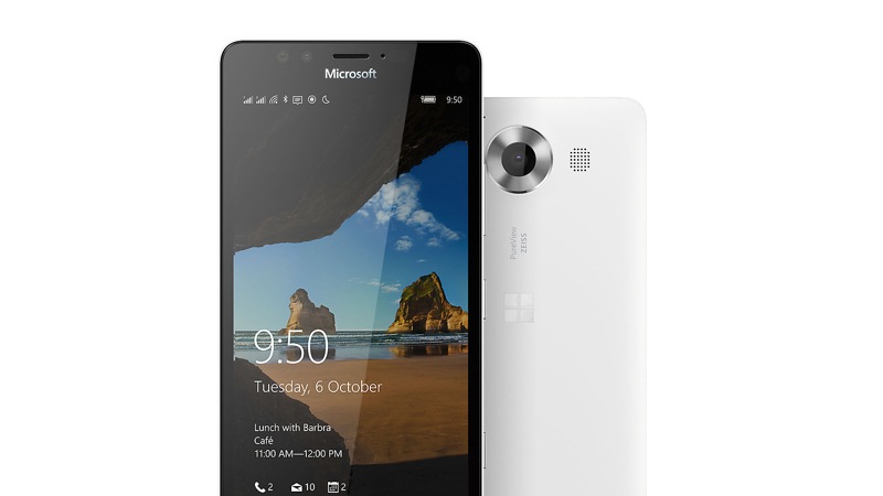 Two white Lumia 950 phones with one facing backward showing camera and one facing forward with Windows lock screen
