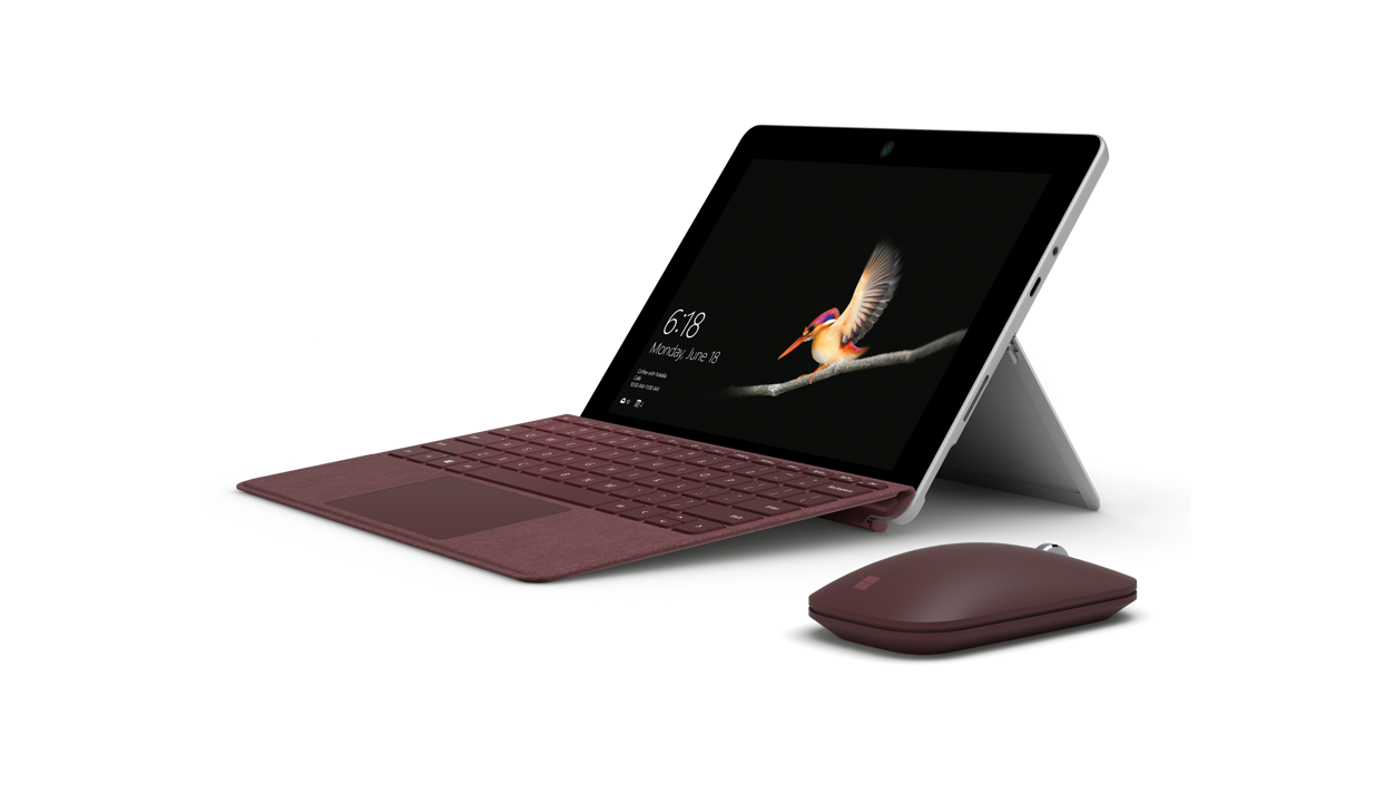 Surface Go with burgundy type cover and mouse