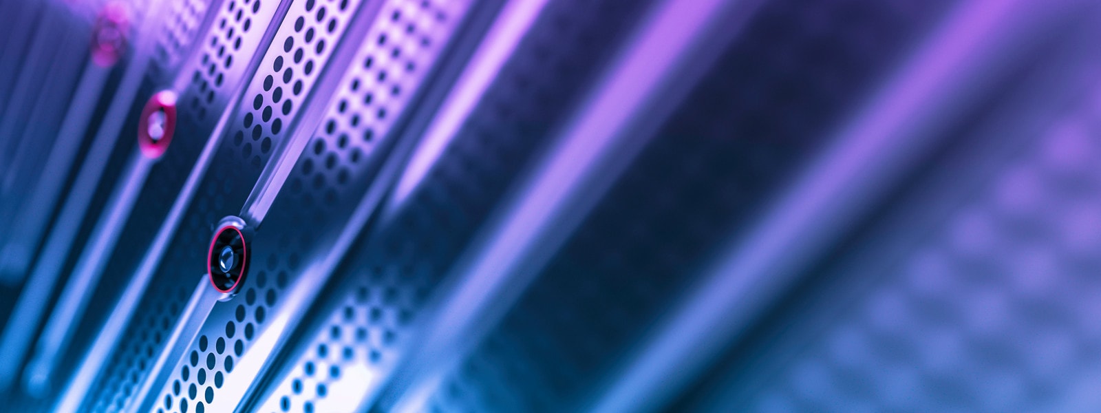 Close view of a server illuminated in blue and purple hues