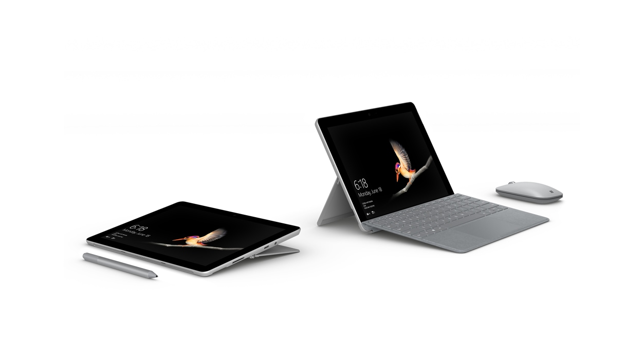Pair of Surface Go devices with Surface Go signature type cover and Surface Pen