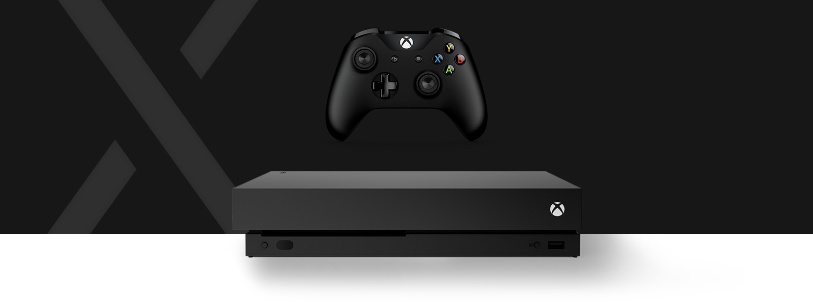Front view of the Xbox One X console in front of a large stylised letter X