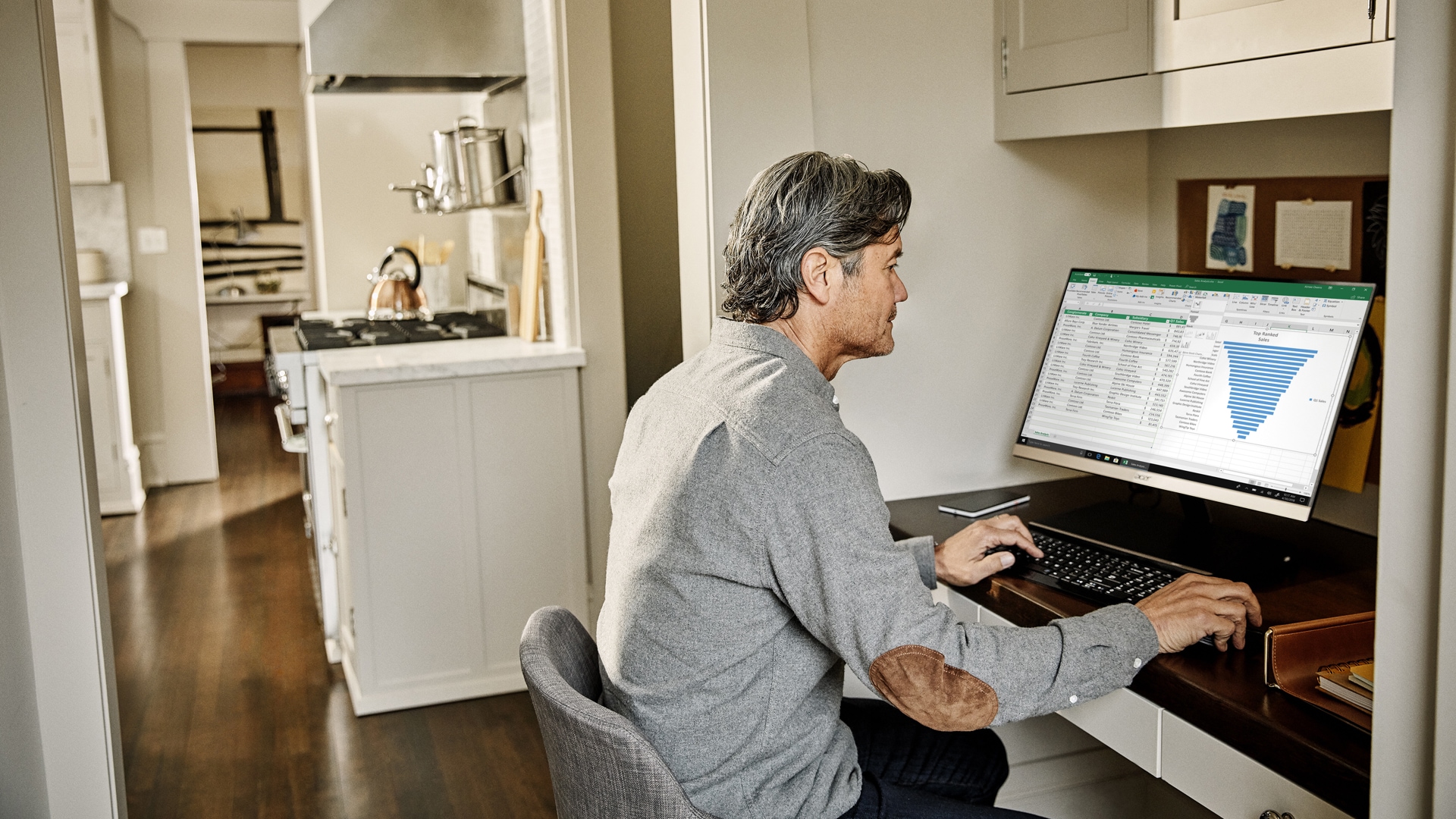 A person using Office applications on their Windows device