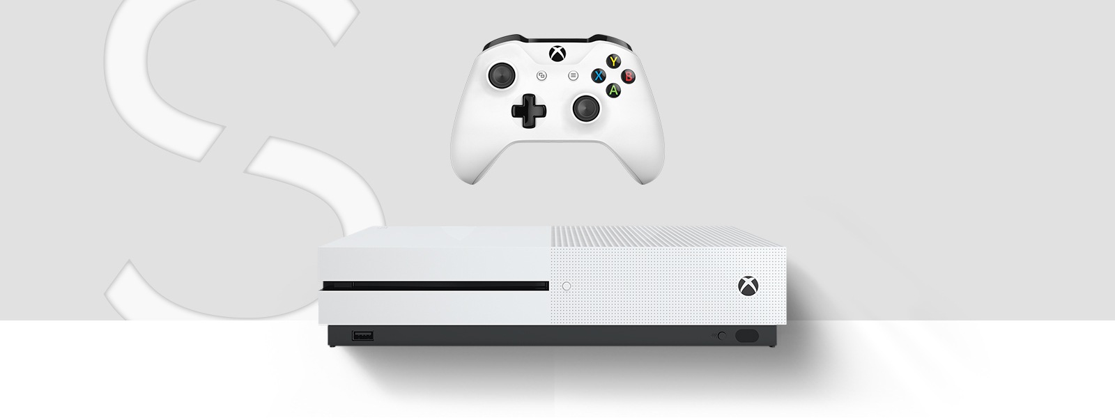 Front view of the Xbox One S console in front of a large stylized letter S