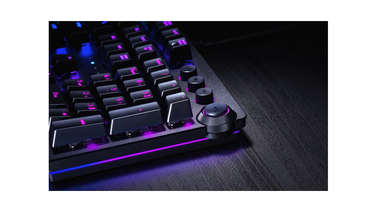 Close up view of Razer Huntsman Elite Opto-Mechanical Gaming Keyboard multi function digital dial 