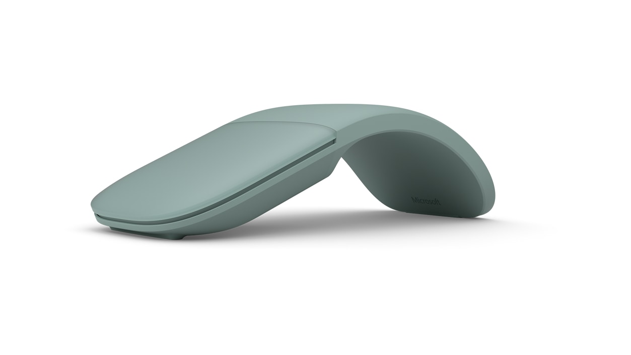 Angled view of sage Microsoft Arc Mouse