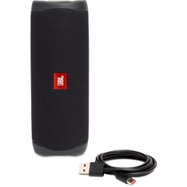Standing view of black JBL FLIP 5 speaker with included USB cable