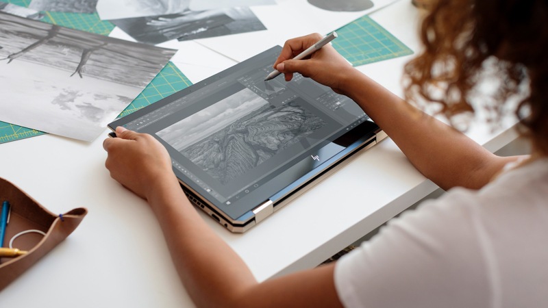 Woman using the HP Spectre x360 Convertible