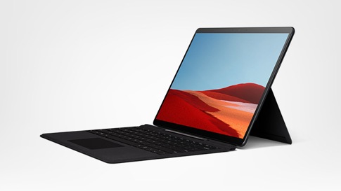 Surface Pro X in laptop mode showing screen, keyboard, and kickstand