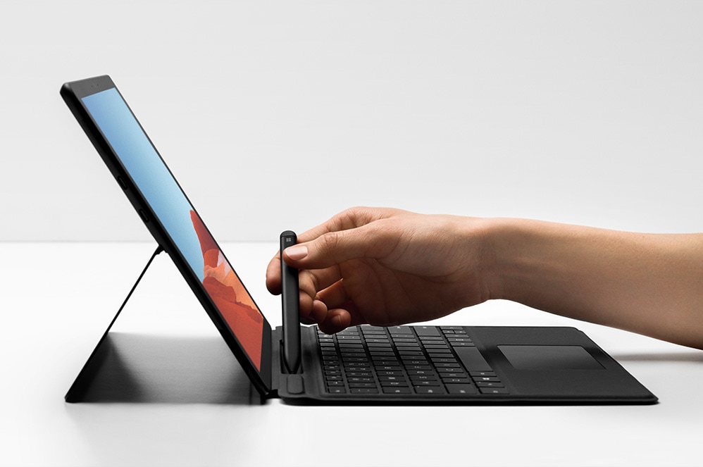 Side view of Surface Surface Pro X with keyboard and kickstand