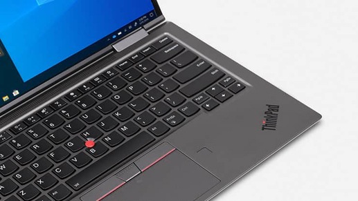 A Lenovo ThinkPad X1 Yoga laptop with a Windows 10 Pro start screen