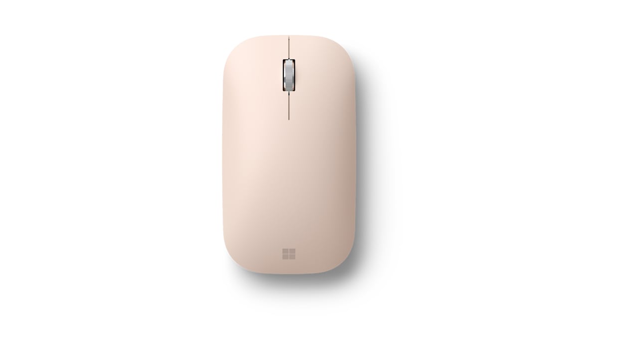 A wireless sandstone Surface Mobile Mouse sits on display.
