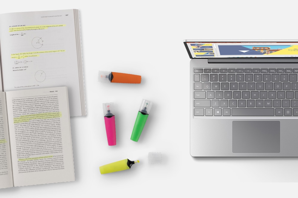 Petit ordinateur portable Surface Laptop Go avec un livre et des surligneurs, Flipgrid et Excel affichés à l’écran