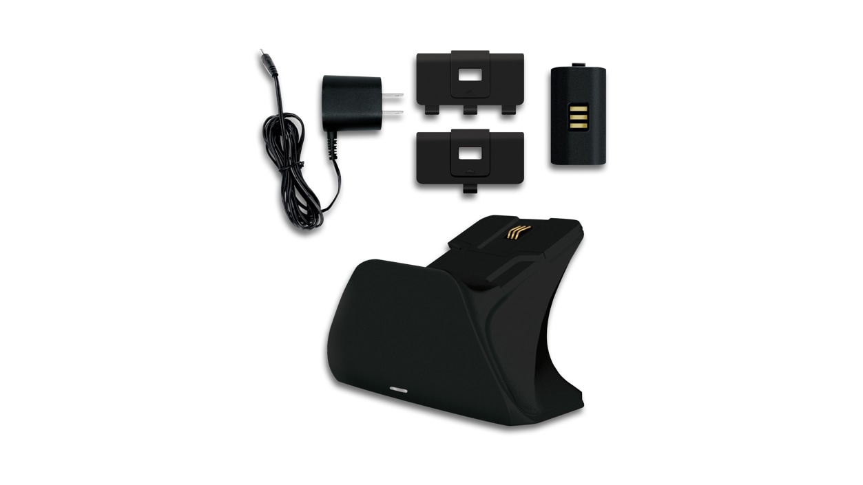 View of the components that come with the Universal Xbox Pro Carbon Black Charging Stand, including power cord and rechargeable battery.