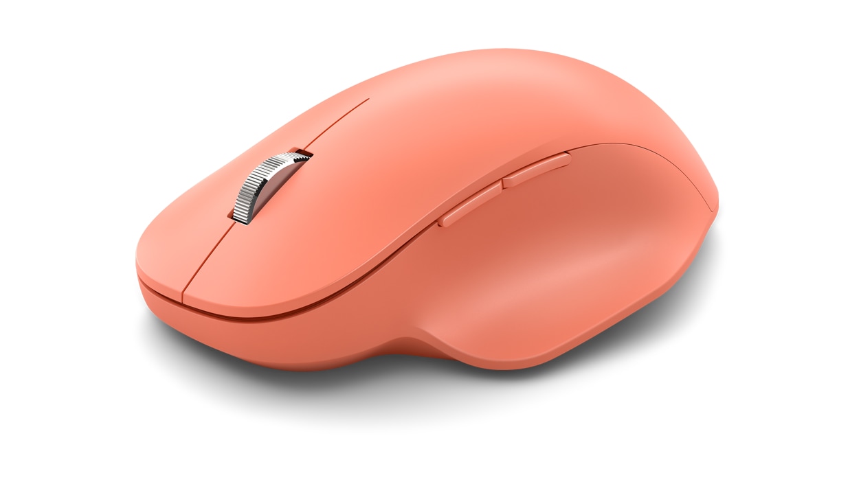 Angled side view of Peach Microsoft Bluetooth Ergonomic Mouse.