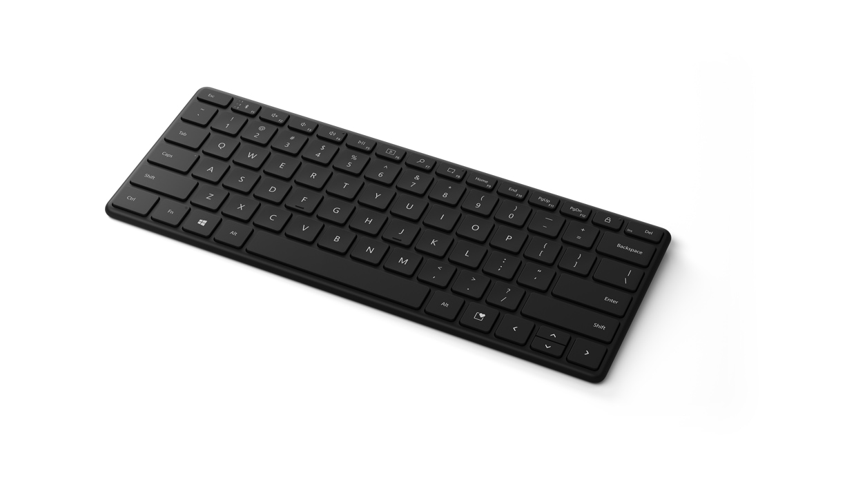 斜めから見た Microsoft Designer Compact Keyboard (ブラック)。