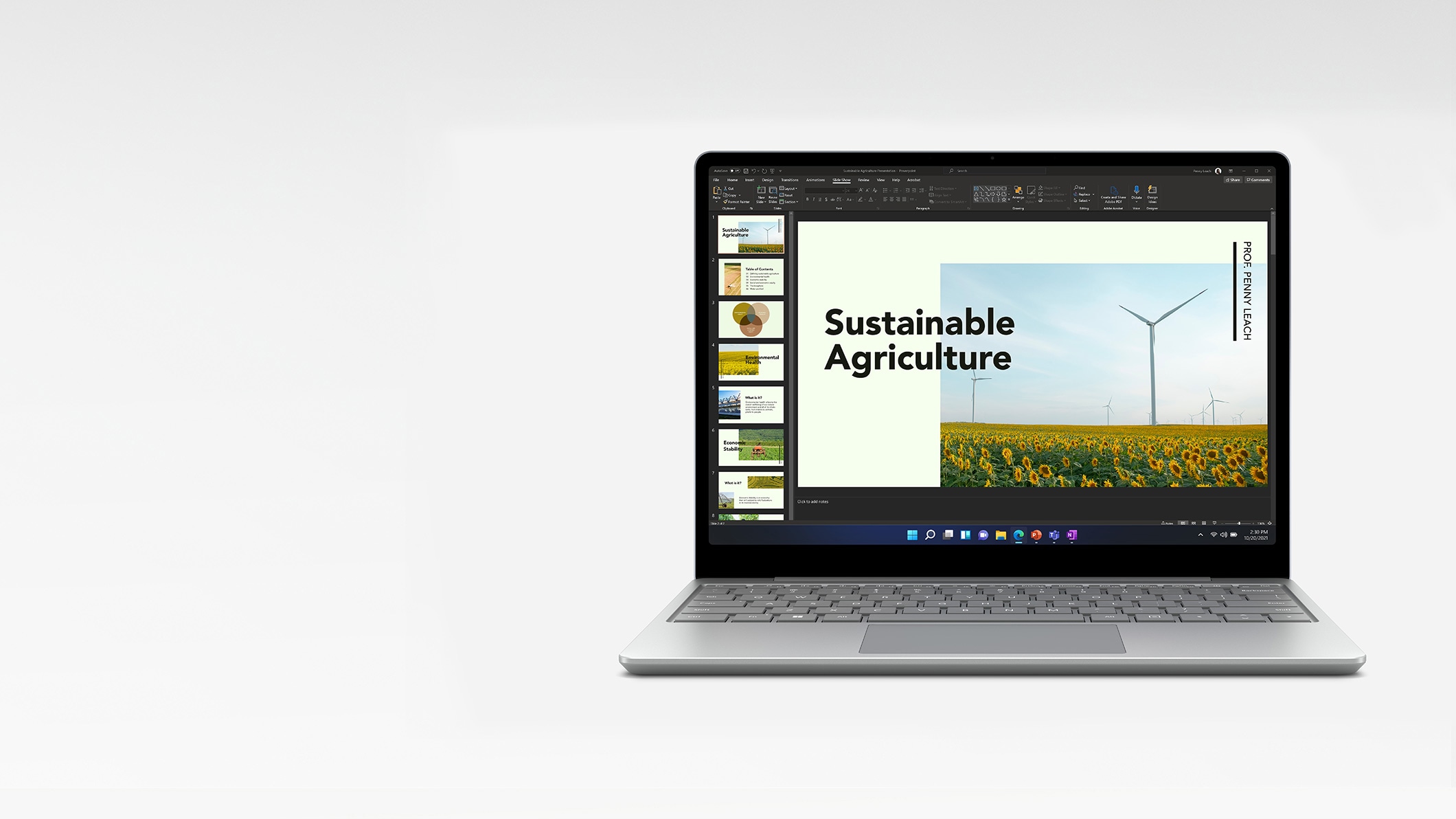 Szemből mutatott Surface Laptop Go, amelynek képernyőjén egy PowerPoint-prezentáció látható