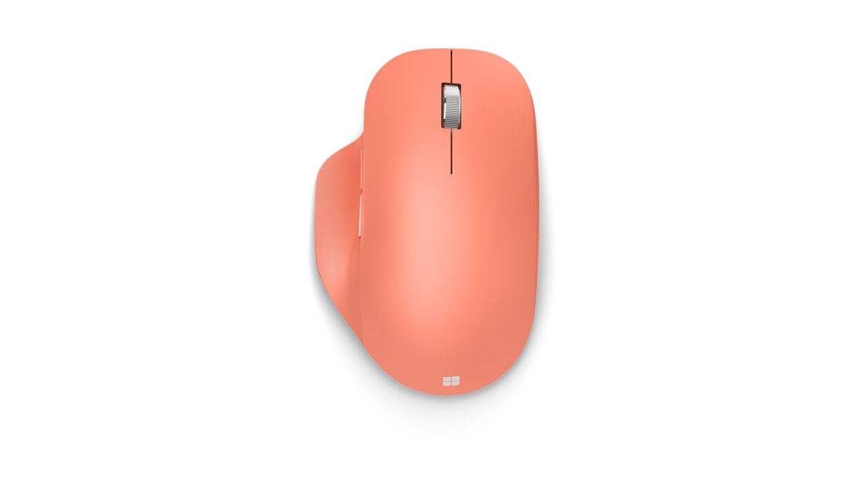 Top view of Peach Microsoft Bluetooth Ergonomic Mouse.