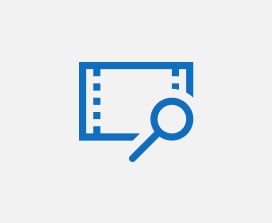 Illustration of a search icon on top of a video reel icon.