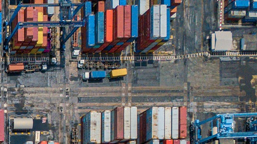Cargo containers in a shipyard