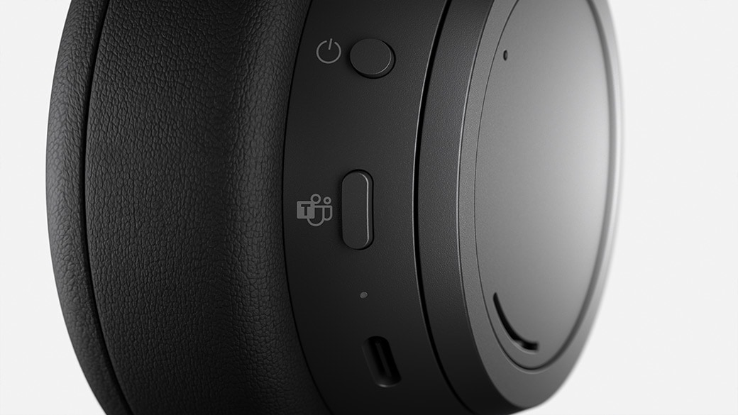 Close-up view of the Teams Button on the ear cup on Surface Headphones 2+