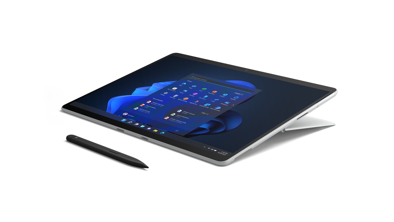 Studio angled view of the Surface Pro X for Business in platinum with a Surface Slim Pen.