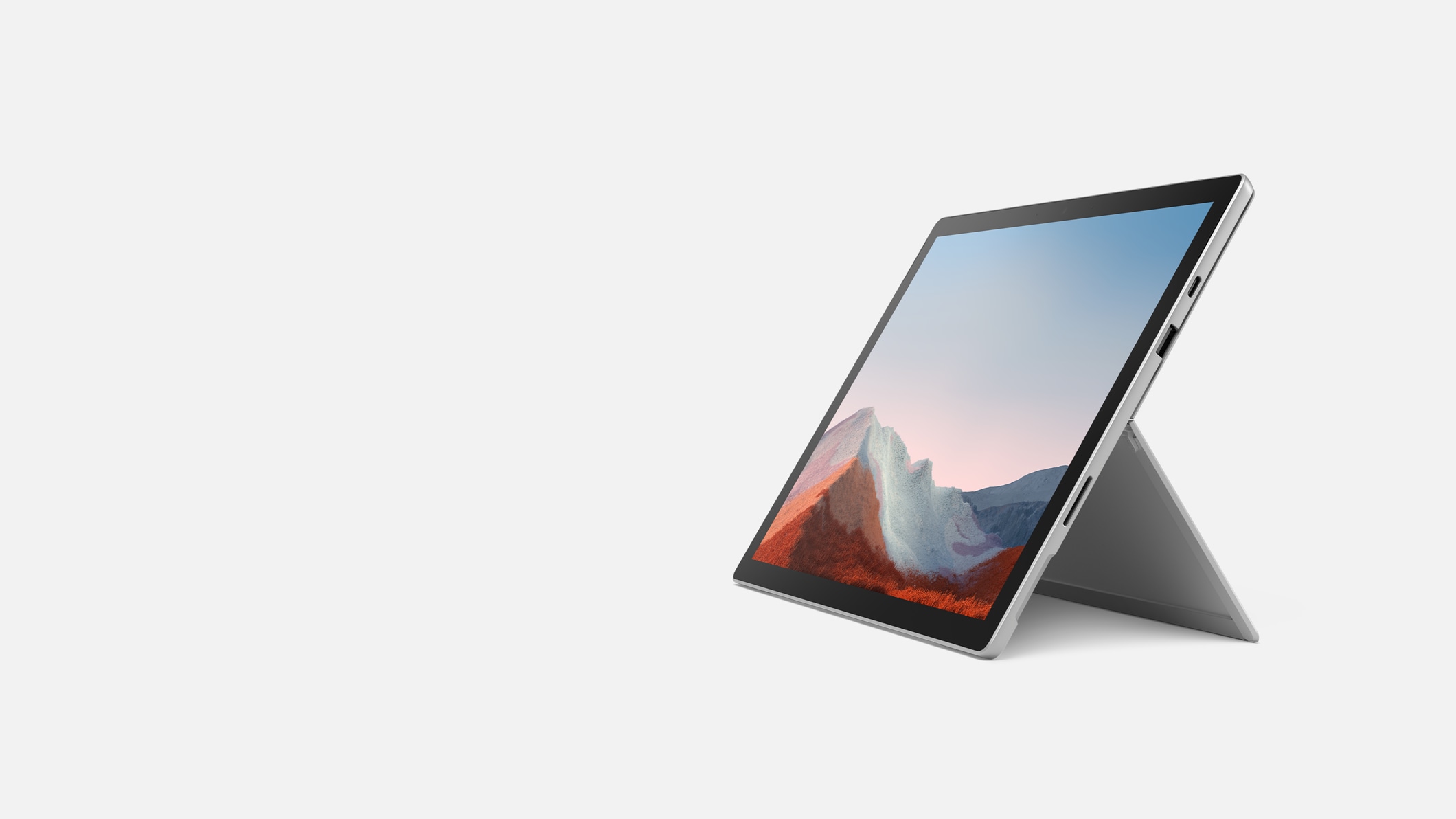 Platina Surface Pro 7+ voor zakelijk gebruik, geplaatst op een kickstand.