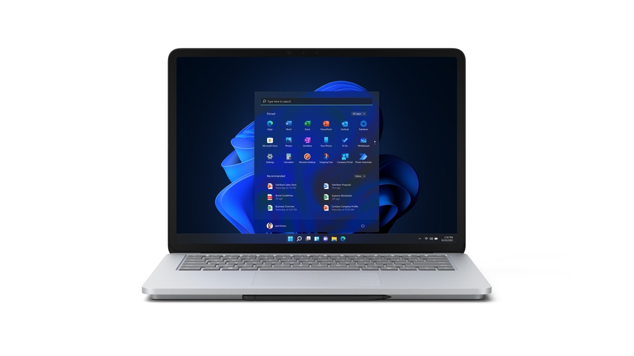 Render of Laptop Studio with Windows 11 dark mode start screen front on in laptop mode