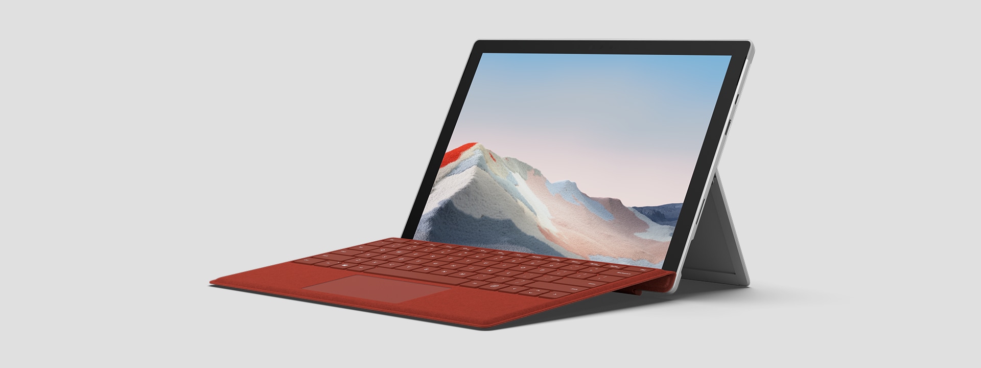 Surface Pro 7+ voor zakelijk gebruik, geplaatst op een kickstand, met scherm en toetsenbord zichtbaar.