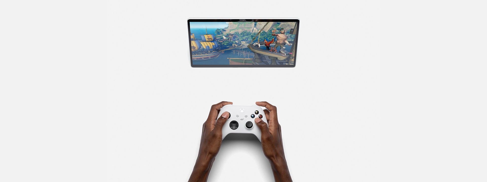 Surface Pro X shown with the Xbox app and Xbox controller.