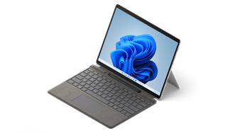Surface Pro X shown with Pro Signature Keyboard and Slim Pen 2.