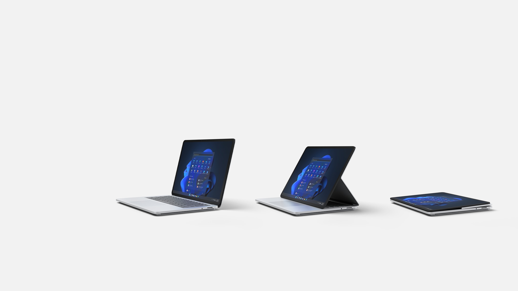 Two Surface Laptop Studio for Business devices.