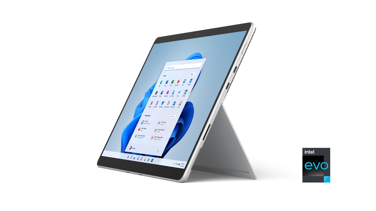 Surface Pro 8 v provedení Platinum v režimu tabletu na stojánku .