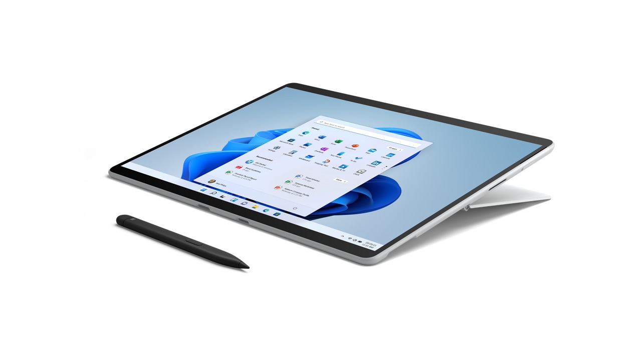 Studio angled view of Surface Pro X device in platinum with a Surface Slim Pen.