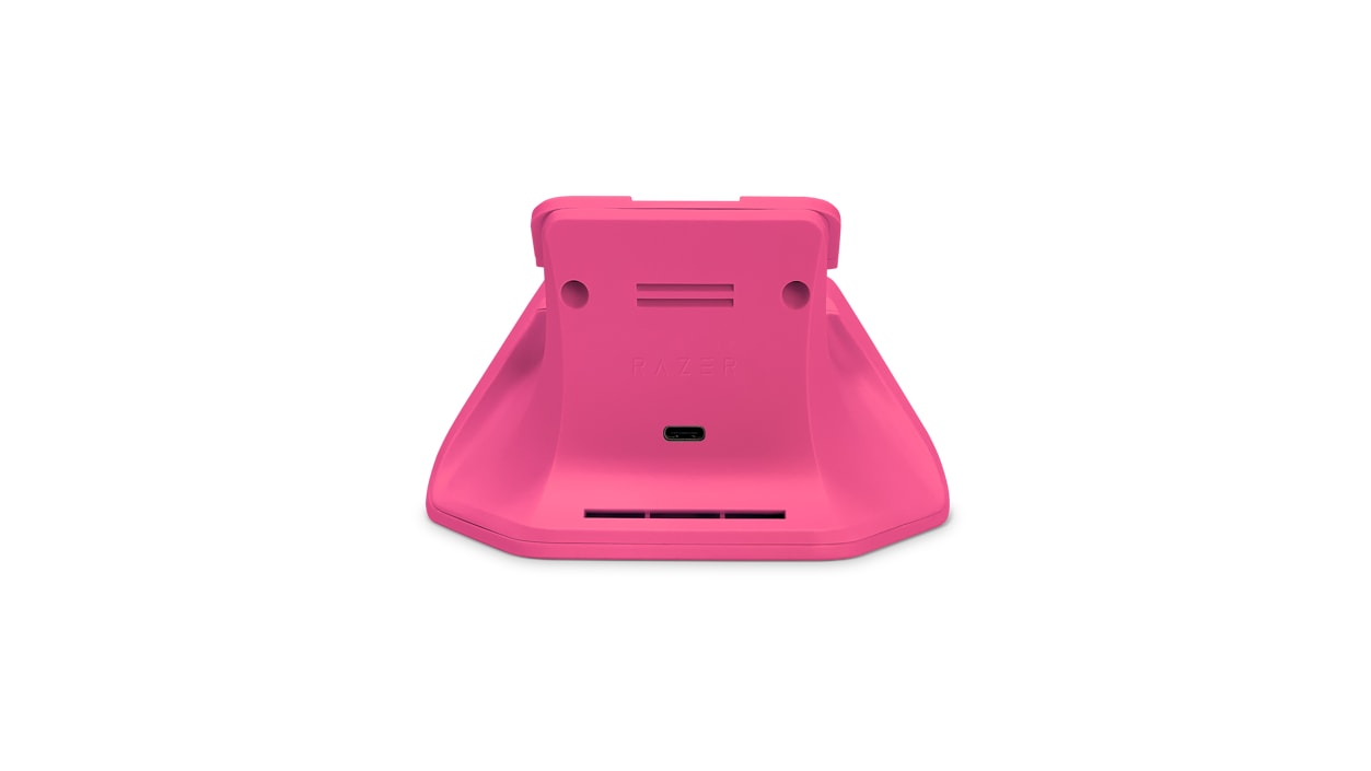 Back view of deep pink Xbox controller charging stand.