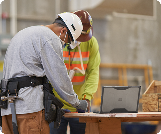 A Surface Laptop Go 2 is observed in an industrial setting
