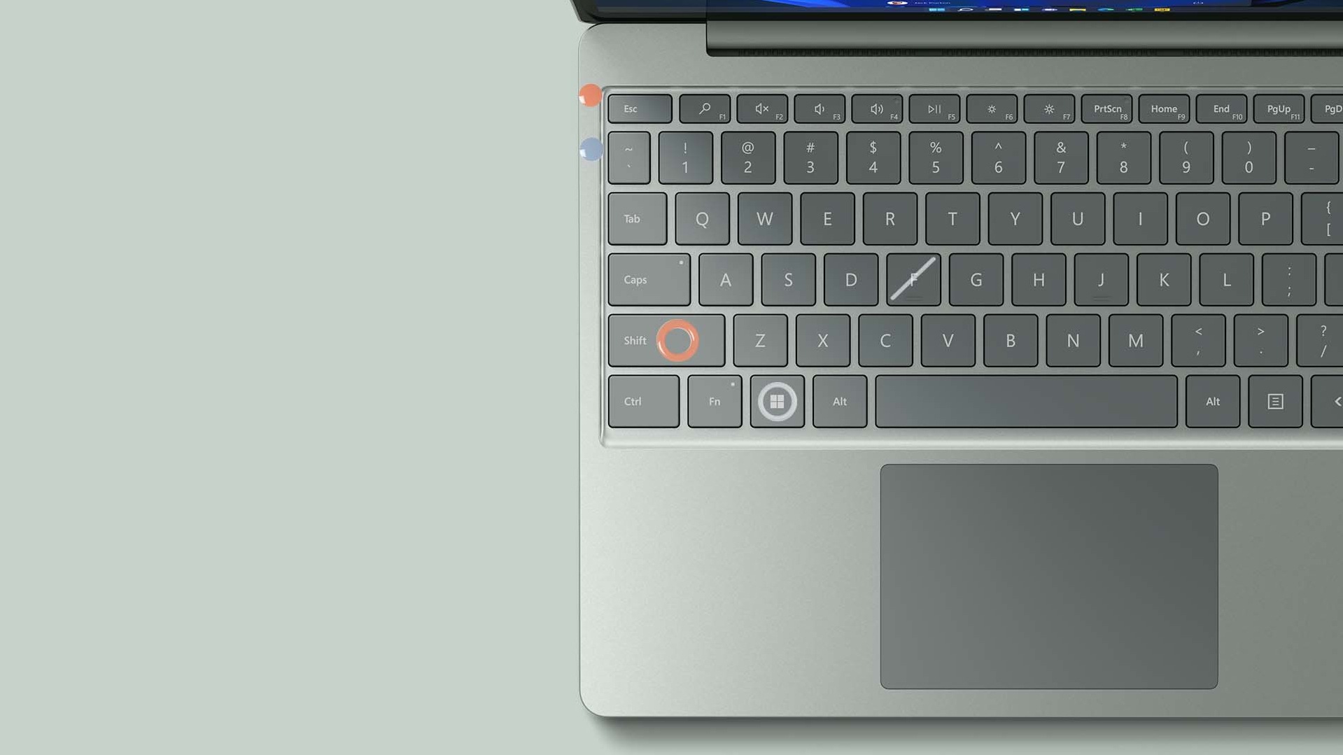 A zoomed in view of the full-size keyboard on Surface Laptop Go 2. Elements of the Surface Adaptive Kit are observed on the keyboard.