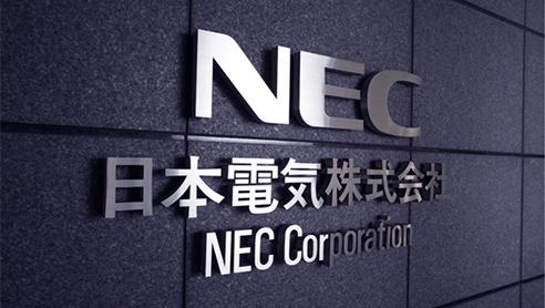 Signage on a wall that reads NEC Corporation.