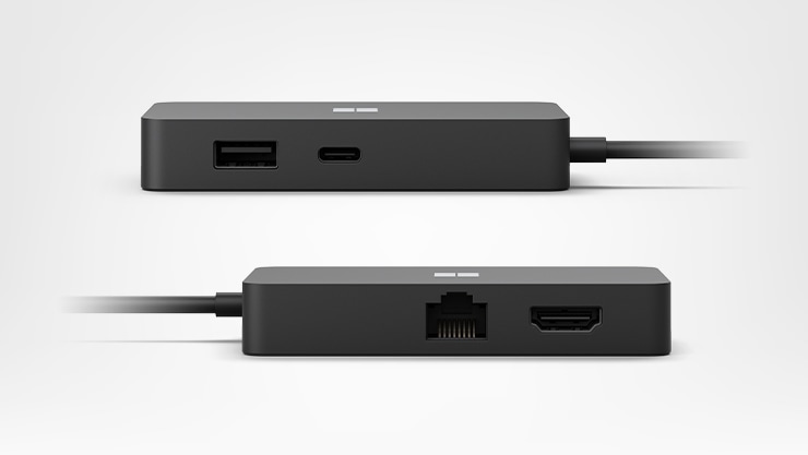 Side view of two Surface Microsoft Surface 127W Power Supply for Business showing ports