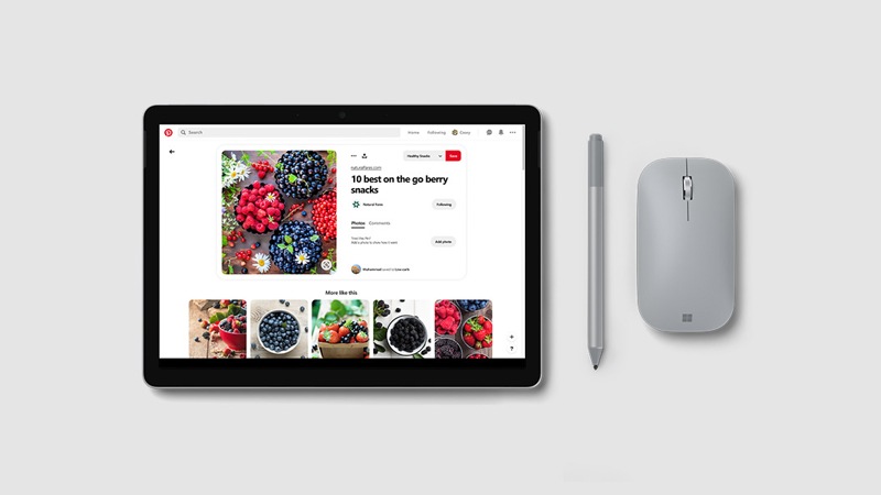Surface 펜이 있는 스튜디오 모드의 Surface Go 2, 색칠하기 그림책 앱을 표시하고 있음