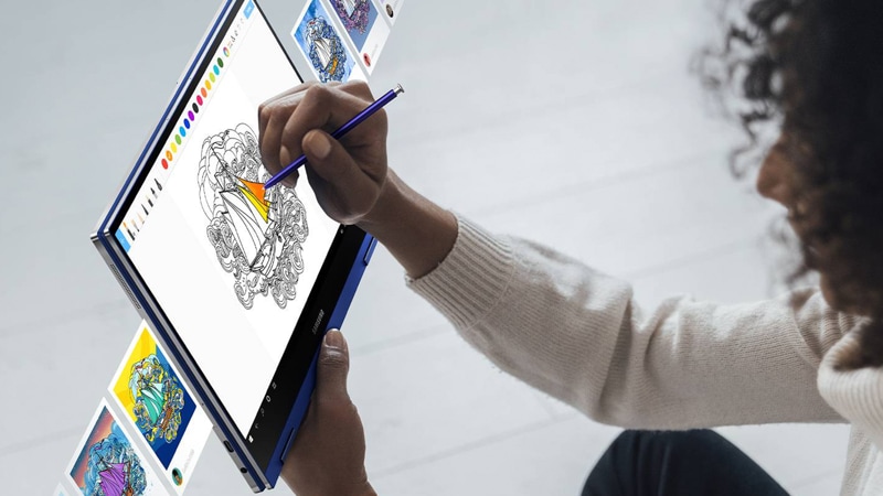 A woman using the Samsung Galaxy Book Flex 13 in tablet mode
