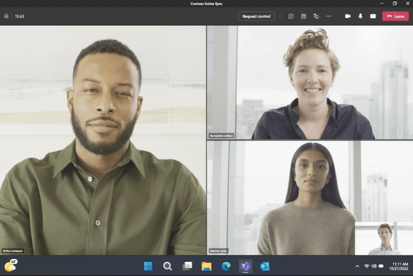 A group of people join a Microsoft Teams call on a Surface Pro 9