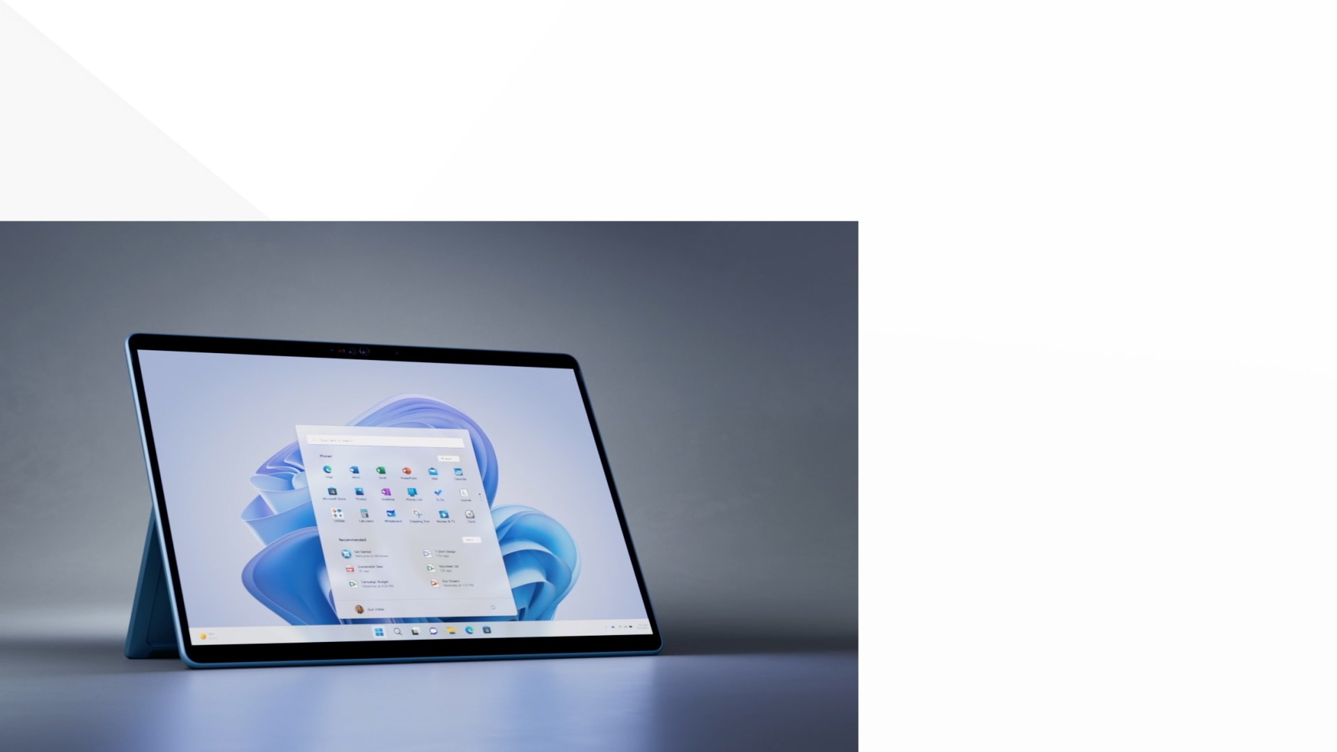 畫面顯示 Surface Pro 9 依著支架站立的半側面。