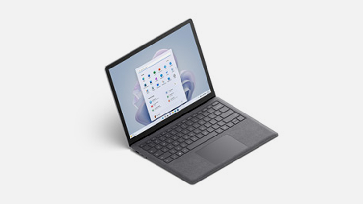 Surface Laptop 5 13.5 inch shown from slightly above and 3/4 view in Platinum.