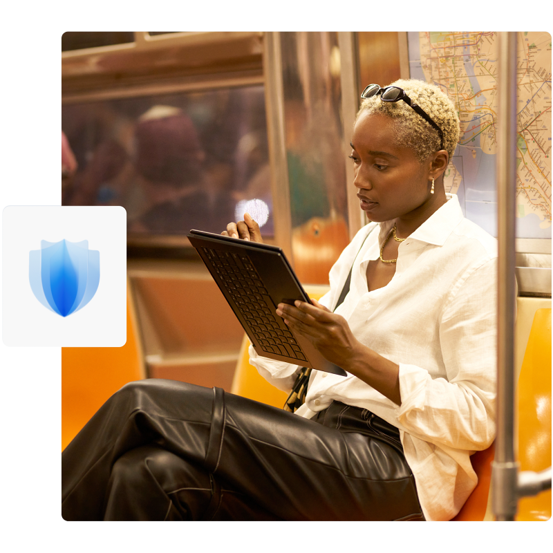 Woman on a subway looking at her device