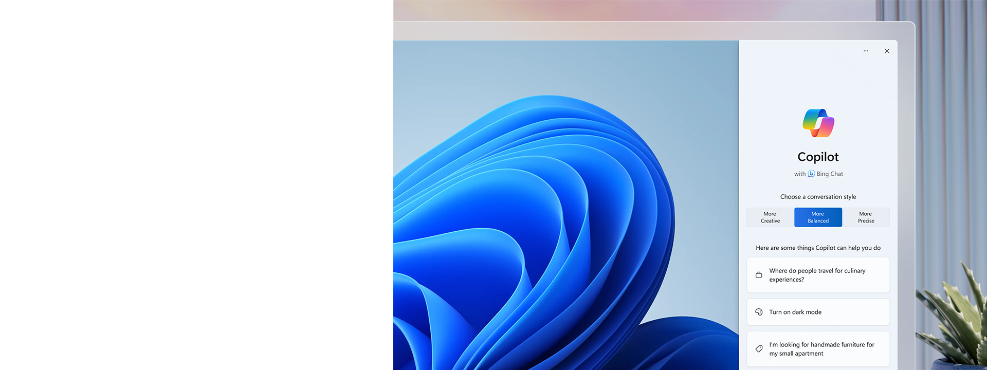 Hoa nở trên Windows 11 và logo Copilot đầy màu sắc