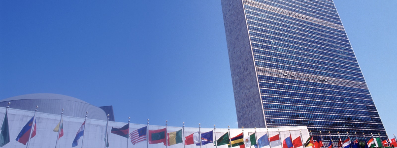 United Nations building with flags