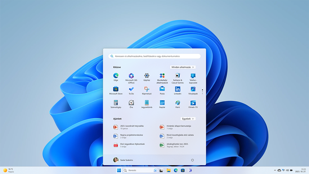 A Windows 11 kezdőképernyője, melyen alkalmazások és beállítások, valamint dokumentumok láthatók.