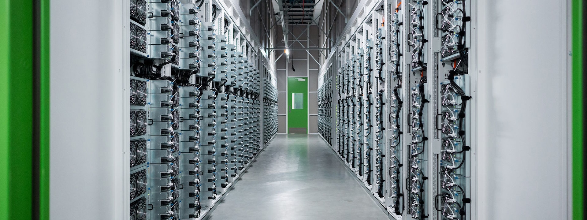 A view looking down an aisle of server banks.