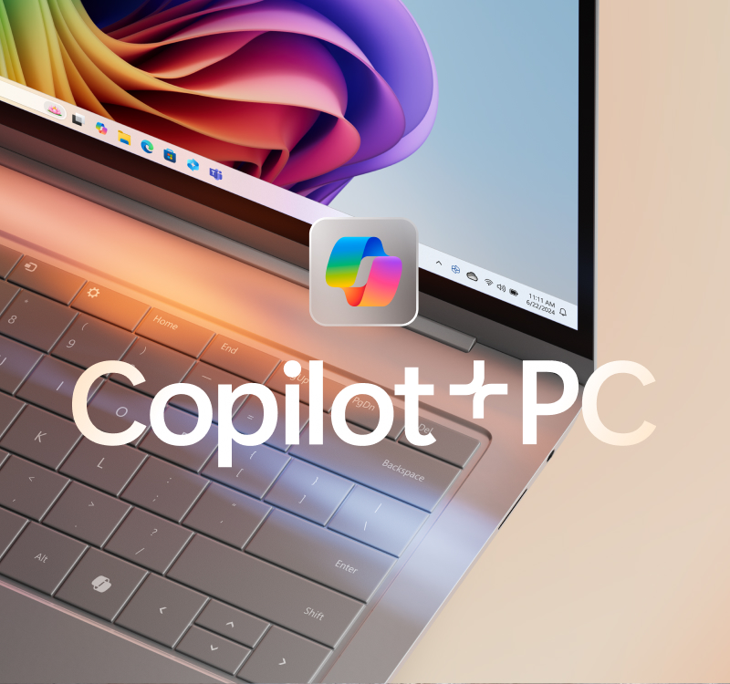 Laptop with Copilot logo and colorful bloom