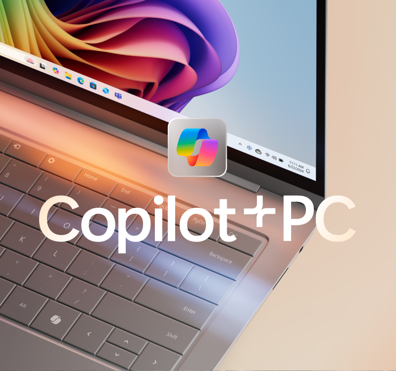 Laptop met Copilot-logo en kleurrijke bloom